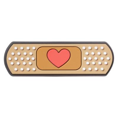 Jibbitz™ crocs bandaid de coração unico