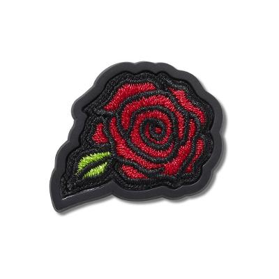 Jibbitz™ emblema rosa  unico