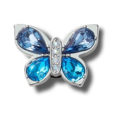 Jibbitz™ borboleta com pedra azul unico