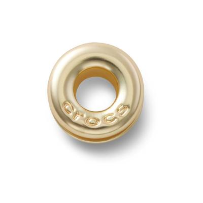 Jibbitz™ Ilhó Dourado
 UNICO