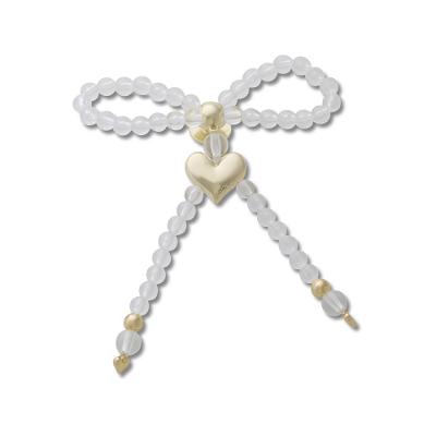 Jibbitz™ Laço de Contas Com Coração Dourado Único