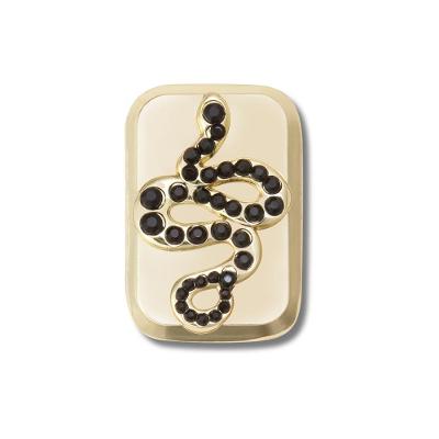 Jibbitz™ Emblema de Cobra Dourada UNICO