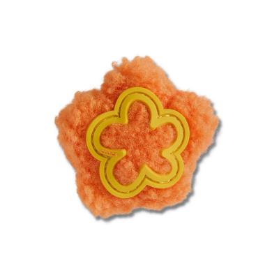 Jibbitz™ Margarida Laranja de Pelúcia
 UNICO
