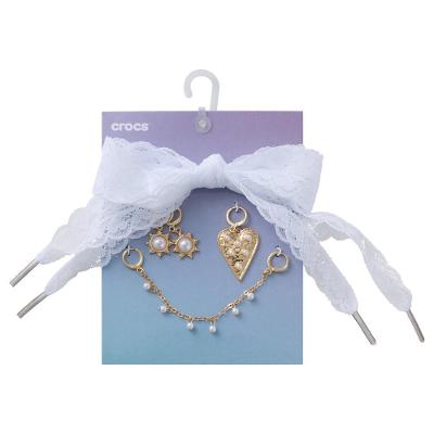 Jibbitz™ Cadarço de Renda e Kit Pingentes de Pérola Único