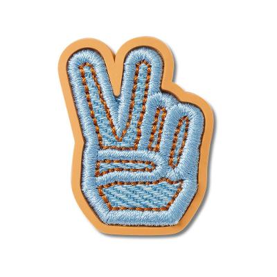 Jibbitz™ Símbolo de Paz em Jeans
 Único