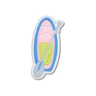 Jibbitz™ Prancha com Remo Muda de Cor UNICO