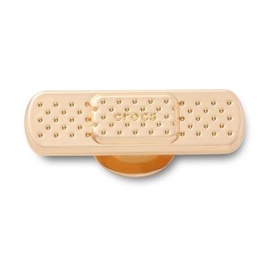 Jibbitz™ Bandagem Dourada Único