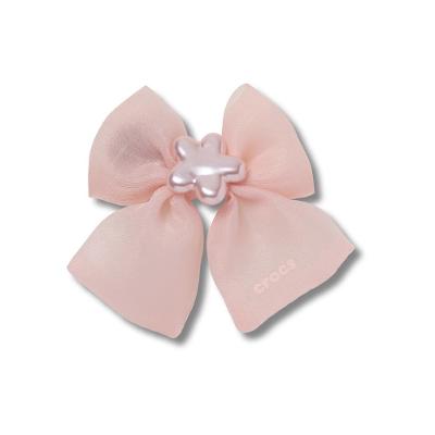 Jibbitz™ Laço Rosa Único