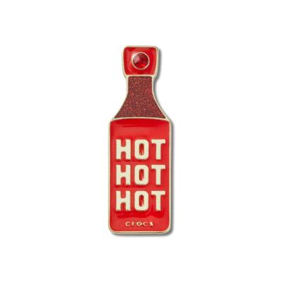 Jibbitz™ Molho Picante Dourado Único