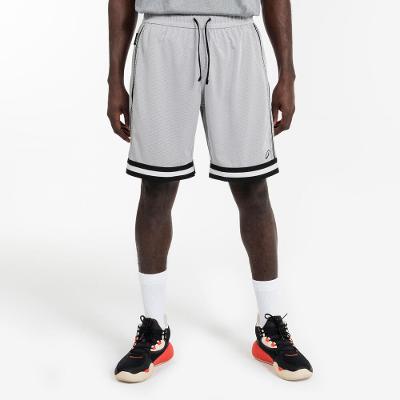 Shorts adulto reversivel de basquete 500 Kipsta