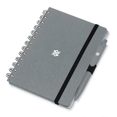 Caderno  folhas impermeáveis e caneta