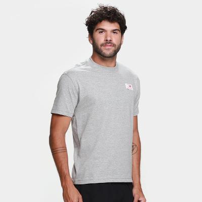 Camiseta New Balance Woven Label Masculina