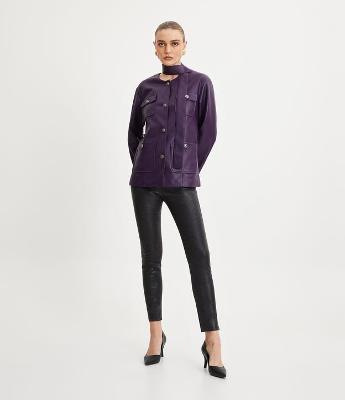 Calça Skinny em Sarja Resinada com Estampa Animal Print Onça