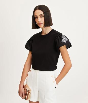 Blusa em Algodão com Mangas Amplas Bufantes e Bordado em Renda