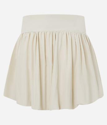Saia Balonê Alfaiatada com Pregas e Fechamento Lateral em Zíper