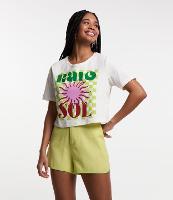 Blusa T-shirt em Algodão com Fundo Quadriculado e Estampa Raio de Sol - 1