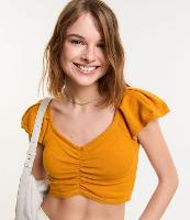 Blusa Cropped em Tricô com Puxadinho no Busto e Babado na Manga - 1