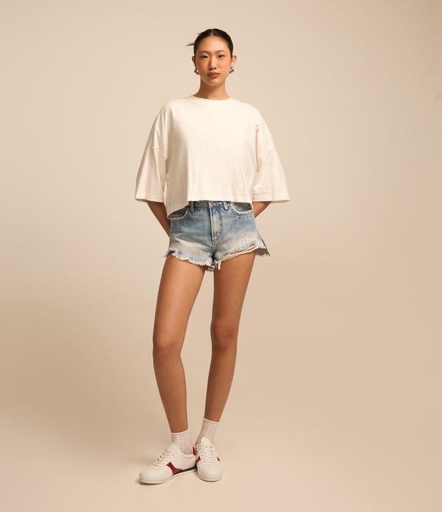 Short Curto em Jeans com Puídos e Barra de Franja - 1