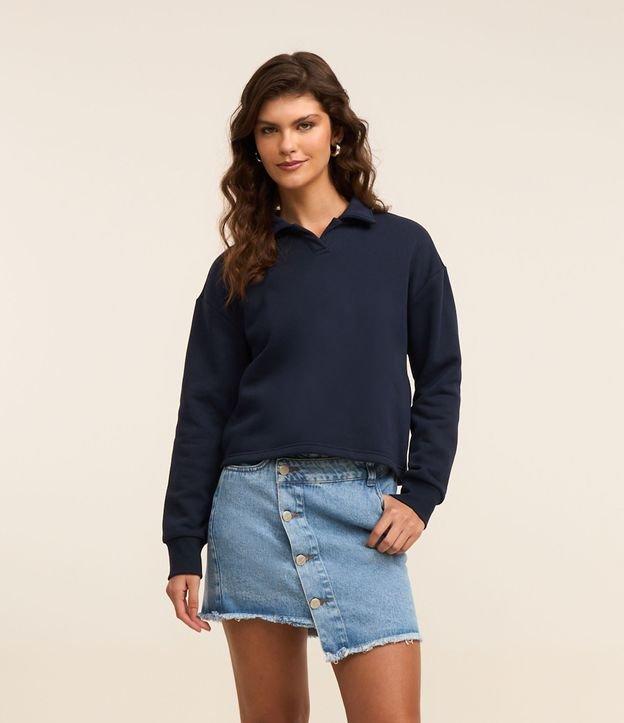 Mini Saia em Jeans com Abotoamento Deslocado e Barra Desfiada - 2