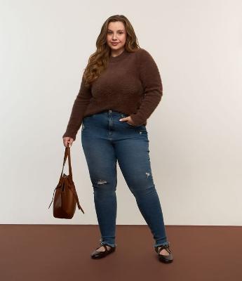 Calça Skinny em Jeans com Puídos e Barra Desfiada Curve & Plus Size