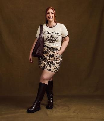 Saia Curta em Sarja com Estampa Animal Print Vaca Curve & Plus Size
