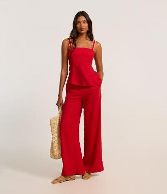 Calça Pantalona em Viscolinho com Bolinhas nos Bolso