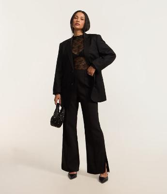 Calça Flare em Viscose com Abertura na Barra e Alfaiatada