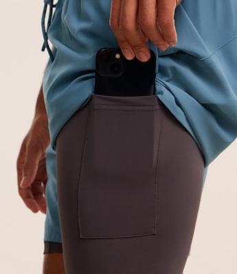 Bermuda Esportiva com Short de Compressão e Bolso Funcional