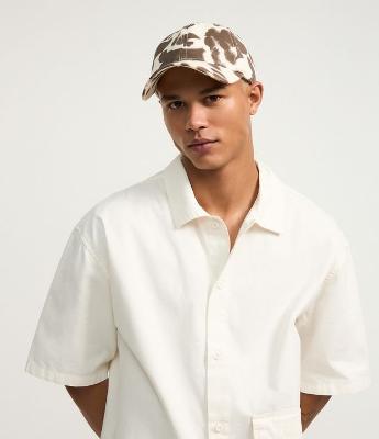 Boné Dad Hat em Sarja Estampada Animal Print Vaquinha