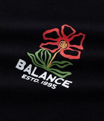 Camiseta Oversized em Algodão com Estampa de Flor e Lettering