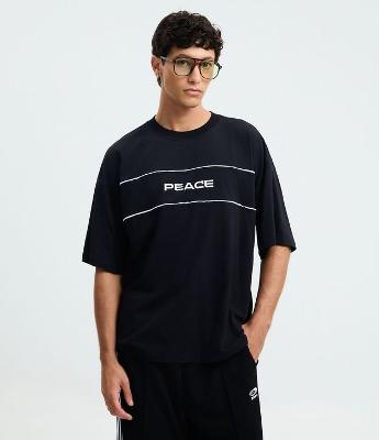 Camiseta Oversized em Algodão com Estampa Lettering Peace