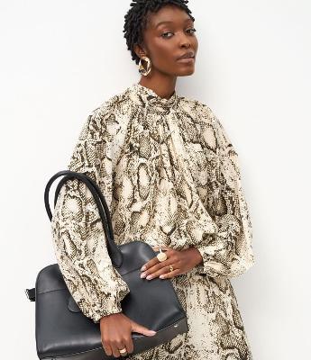 Blusa em Liocel com Manga Bufante e Estampa Animal Print