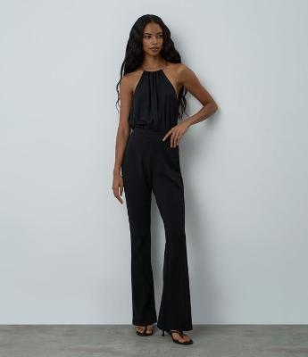 Calça Flare em Ponto Roma