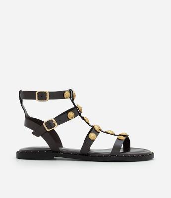 Rasteira Gladiadora em PU com Aviamentos de Moedas