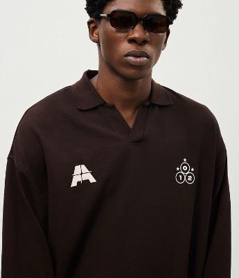 Camiseta Manga Longa Gola Polo Texturizada com Ícone no Peito