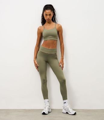 Calça Legging Esportiva em Microfibra com Bolso e Friso Contrastante
