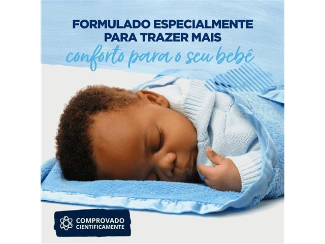 Lava-Roupas Líquido Omo Puro Cuidado 900ml Embalagem Econômica - 4