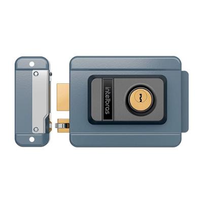 Fechadura Elétrica FX 1500 de Sobrepor Acionamento por Chave para Porta Madeira Aço Cinza