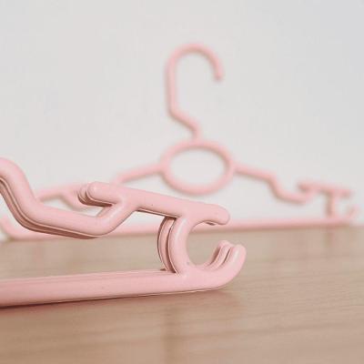 Kit 50 Cabides Infantil Baby para Roupas em Polipropileno Plástico Reforçado Antideslizante Rosa OEM