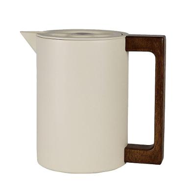 Garrafa Térmica Brusque 0,6L em Aço Inox com Alça Ergonômica para Bebidas Quentes e Frias Bege Tuut