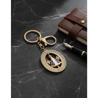 Chaveiro Religioso de Nossa Senhora Aparecida em Metal Dourado Dantas
