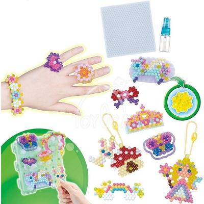 Brinquedo Aquabeads Mundo das Fadas com Beads e Acessórios Vestíveis Epoch
