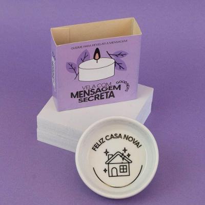 Vela Aromática Vanilla At Home com Mensagem Secreta FELIZ CASA NOVA! em Cerâmica Branco