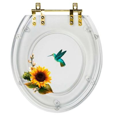 Assento Sanitário Girassol Beija Flor Oval Resina Plástica Parafusado Convencional Transparente